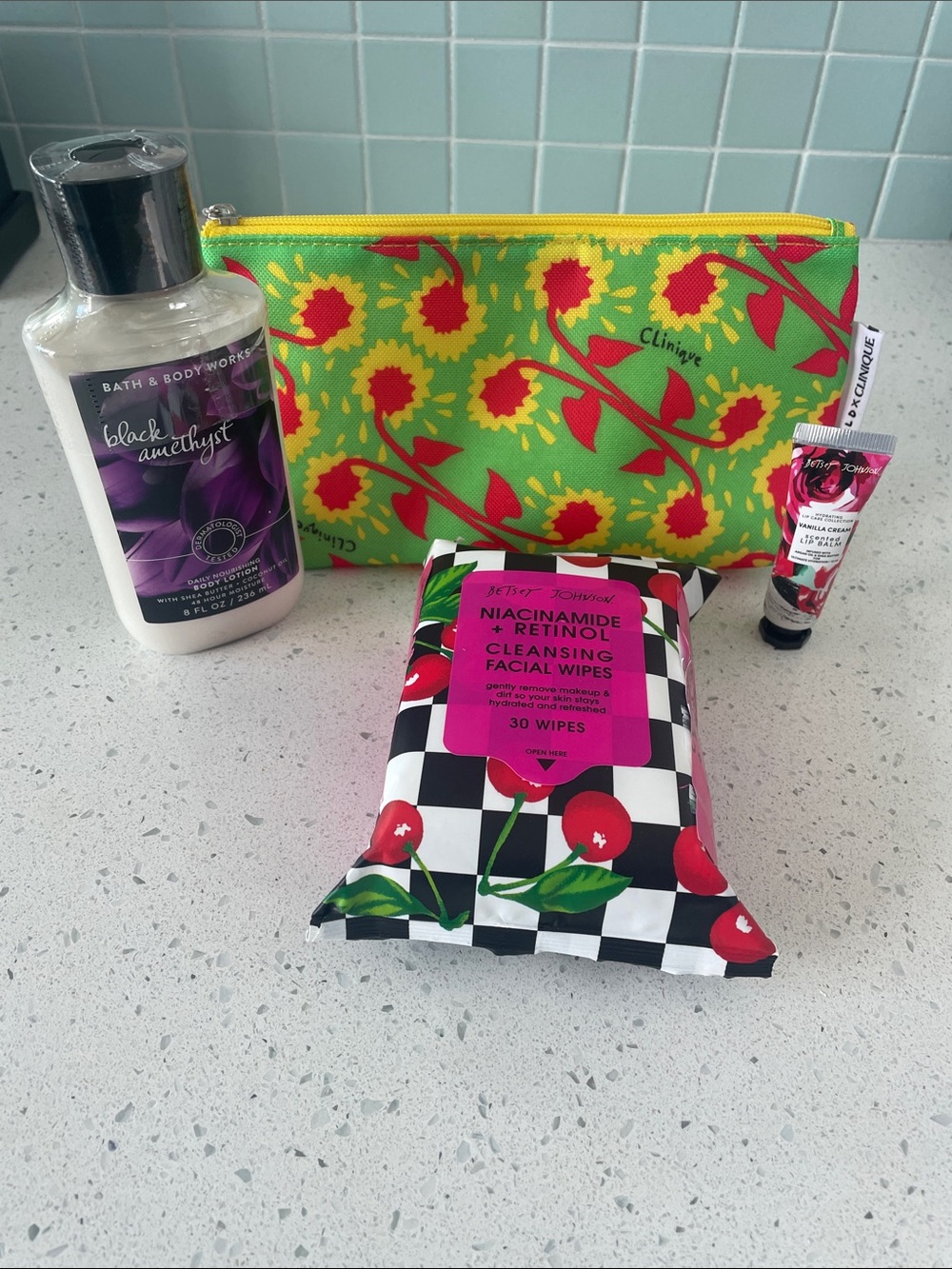 Bundle -Clinique Makeup bag, BBW lotion, Betsey Johnson face wipes, and lip balm